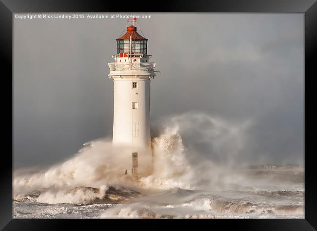  Lighthouse in a storm Framed Print by Rick Lindley