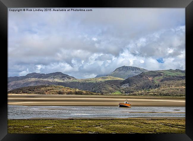  The Little Red Boat Framed Print by Rick Lindley