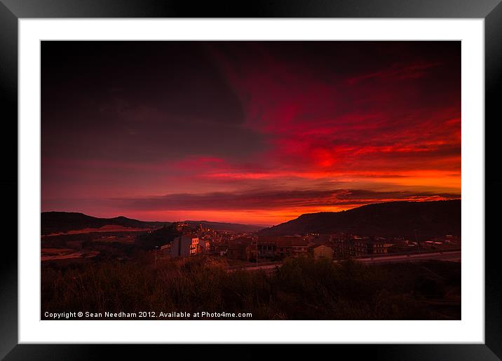 A fiery sunset. Framed Mounted Print by Sean Needham