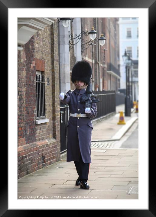 Irish Grenadier Guard marching at St James's Palace, London Framed Mounted Print by Philip Pound