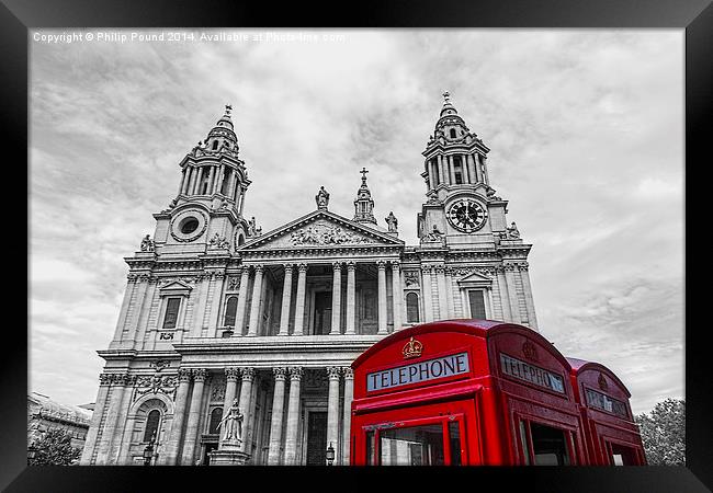  Red Phone boxes in front of black and white St Pa Framed Print by Philip Pound