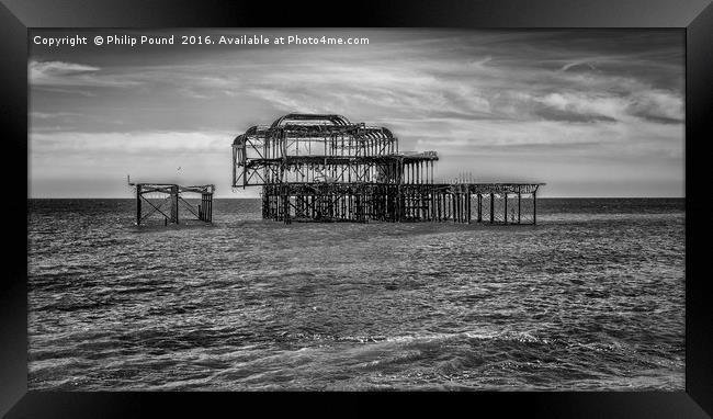 Fire damaged West Pier in Brighton Sussex Framed Print by Philip Pound