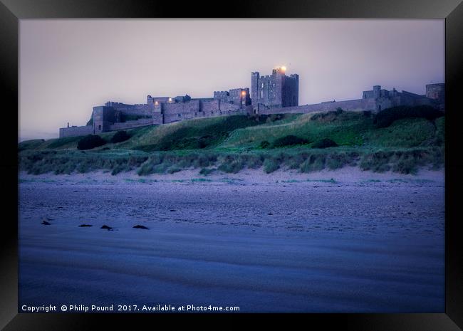 Bamburgh Castle at Sunrise Framed Print by Philip Pound