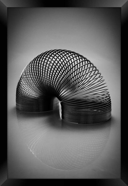 Slinky Framed Print by mike Davies