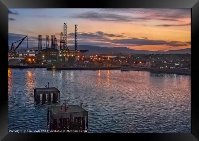 Evening Approach to Invergordon Framed Print by Ian Lewis