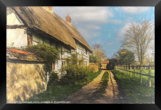 Thatched Cottages In Blewbury Framed Print by Ian Lewis