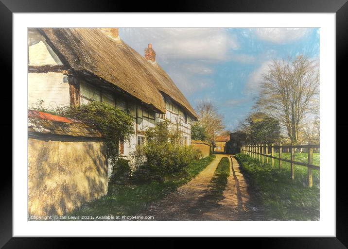 Thatched Cottages In Blewbury Framed Mounted Print by Ian Lewis