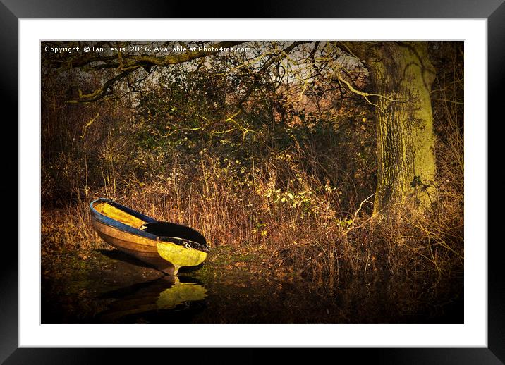 Yellow Rowing Boat Framed Mounted Print by Ian Lewis