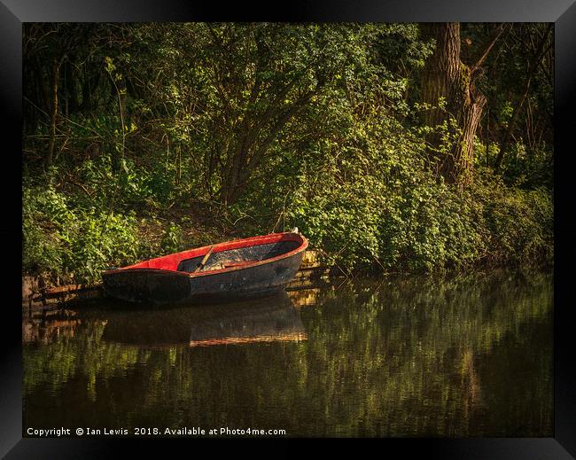 Dinghy On The Oxford Canal Framed Print by Ian Lewis