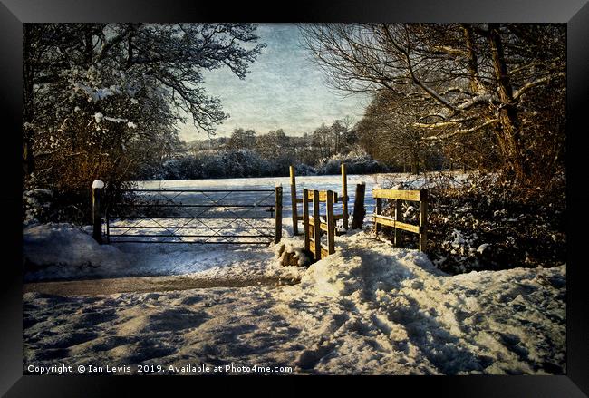 A Snowy Day In Tidmarsh Framed Print by Ian Lewis