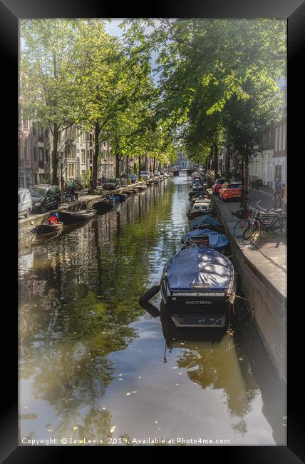 A Street In Amsterdam Framed Print by Ian Lewis