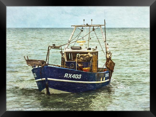 Fishing Boat Leaving the Beach Framed Print by Ian Lewis