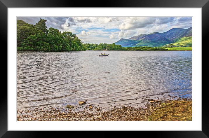 Paddling Over Derwentwater Framed Mounted Print by Ian Lewis
