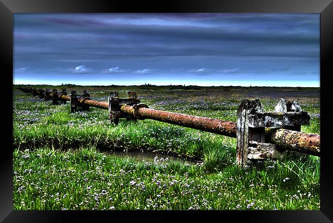 Stiffkey Marshes Outfall Pipe Framed Print by Paul Betts