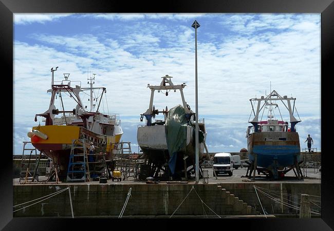 Fishing Boats In Dry Dock Framed Print by Noreen Linale