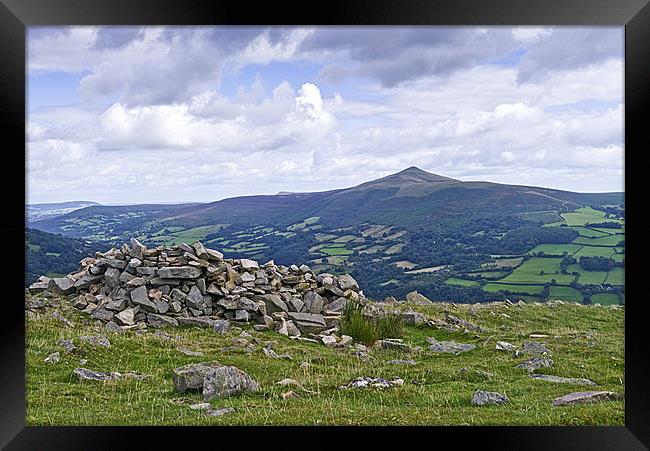 Sugar Loaf in the distance Framed Print by Hazel Powell