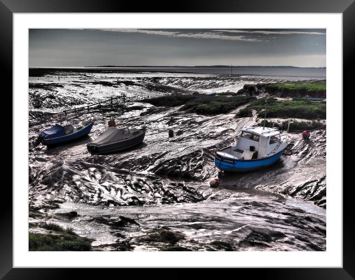 Fishing boats in harbour at low tide Framed Mounted Print by mark humpage