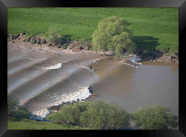 Surfers on the Severn Bore Aerial Framed Print by mark humpage
