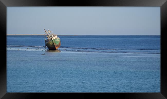 Shipwreck stranded in sea with beach Framed Print by mark humpage