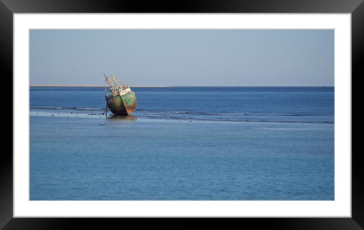 Shipwreck stranded in sea with beach Framed Mounted Print by mark humpage