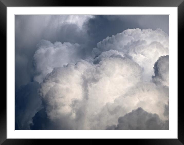 Vibrant storm clouds bubbling Framed Mounted Print by mark humpage