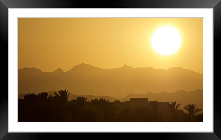 Sunset over desert mountains Framed Mounted Print by mark humpage