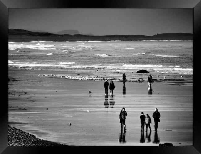 North Norfolk coast with people walking on beach black and white Framed Print by mark humpage