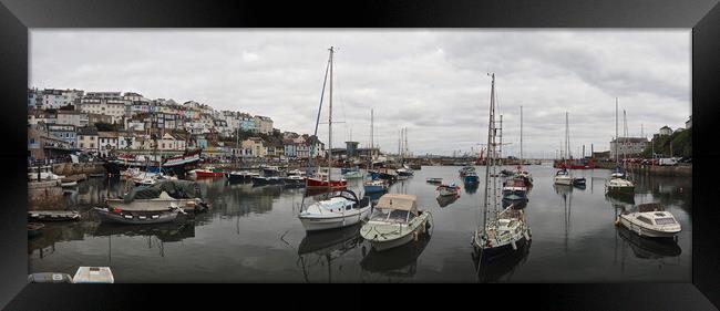 Sailing boats on water in Brixham harbour Framed Print by mark humpage