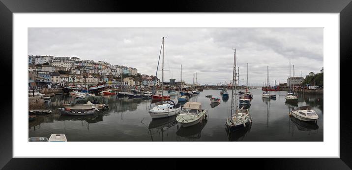 Sailing boats on water in Brixham harbour Framed Mounted Print by mark humpage