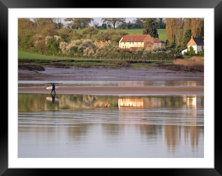 Surfers walking out to water for wave Framed Mounted Print by mark humpage