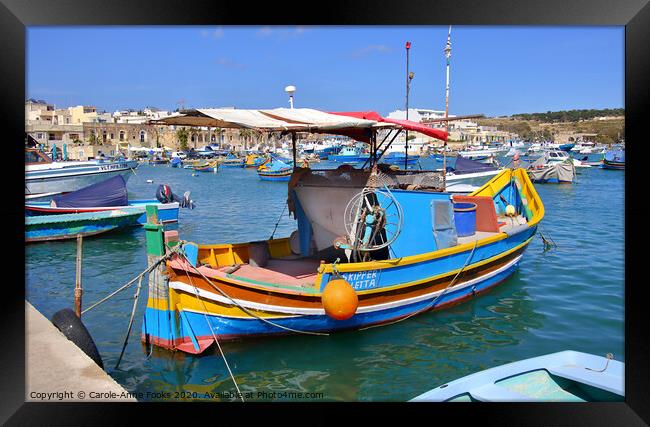 Marsaxlokk Waterfront, Malta. Framed Print by Carole-Anne Fooks