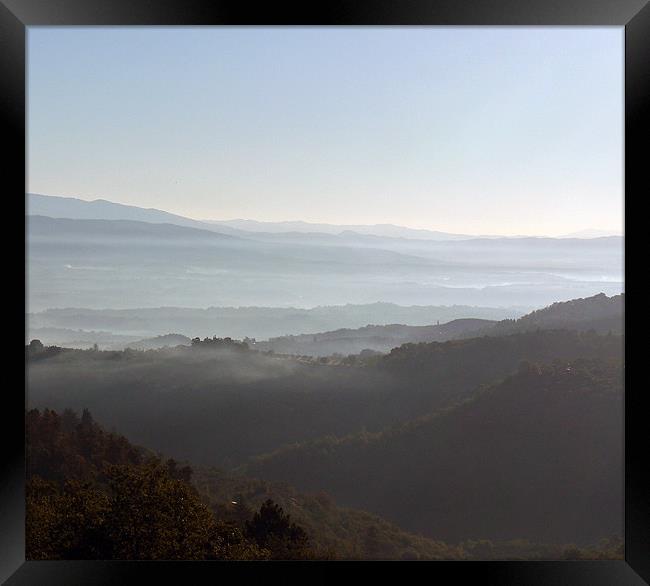 Tuscan Valleys of mist Framed Print by Richard Ashton