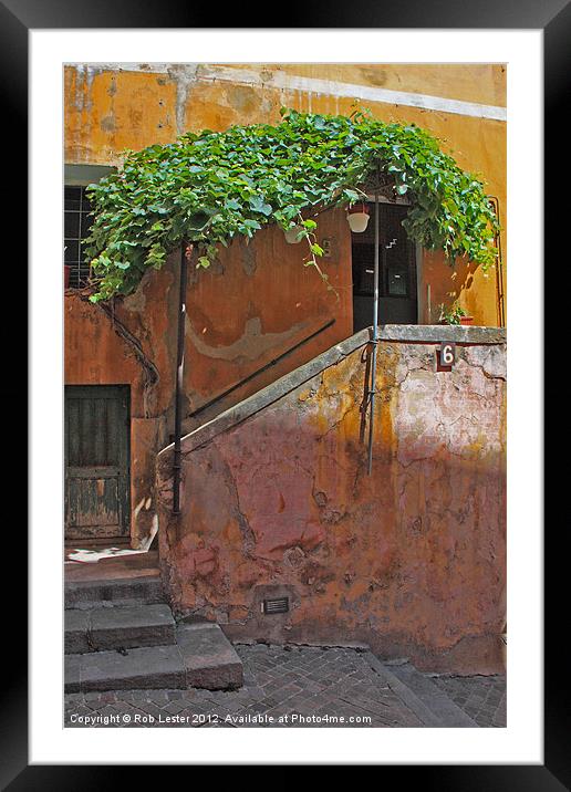 Une porte rustique Framed Mounted Print by Rob Lester