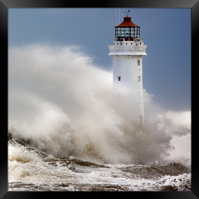 New Brighton lighthouse Facing the fury Framed Print by Rob Lester