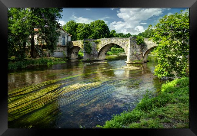 Boudeilles, a bridge on the river Dronne Framed Print by Rob Lester