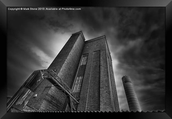 Ominous brick tower & chimney against stormy sky Framed Print by Mark Stone