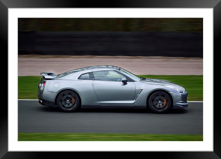 Nissan GTR rounding Oulton Park Framed Mounted Print by Steven Murphy