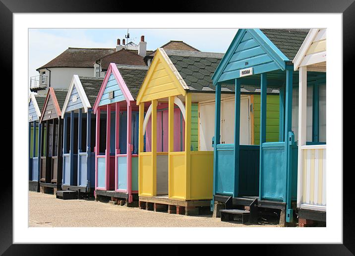 colourful Southwold beach huts Framed Mounted Print by dennis brown