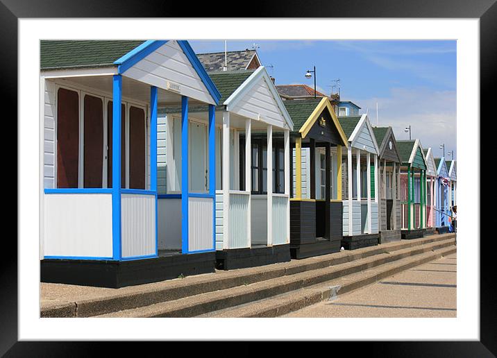 Beach huts Framed Mounted Print by dennis brown