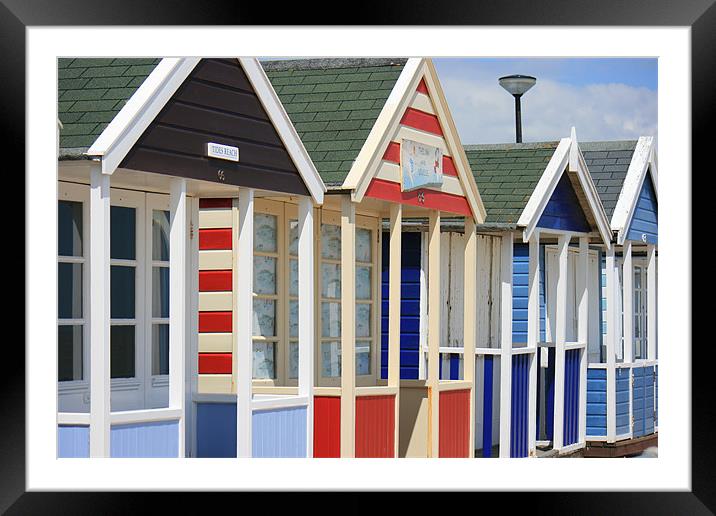 Southwold beach huts Framed Mounted Print by dennis brown
