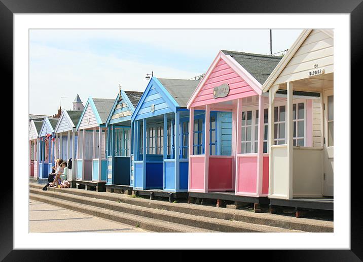 East Anglian beach huts Framed Mounted Print by dennis brown