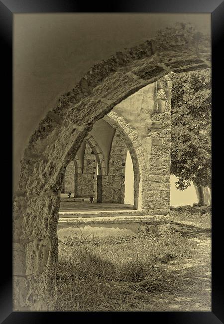 Arches of old Rethymnon Framed Print by Rod Ohlsson