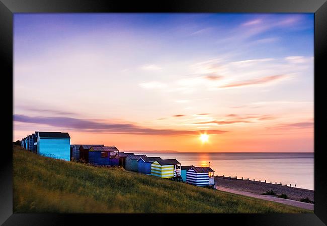 Beach Huts at Sunset Framed Print by Ian Hufton
