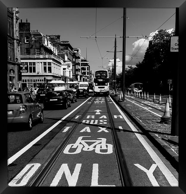 Tramlines Framed Print by John Hastings