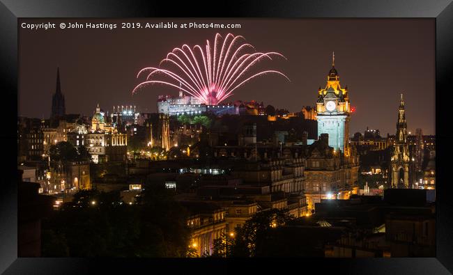 Edinburgh Castle Illuminated by Fireworks Framed Print by John Hastings