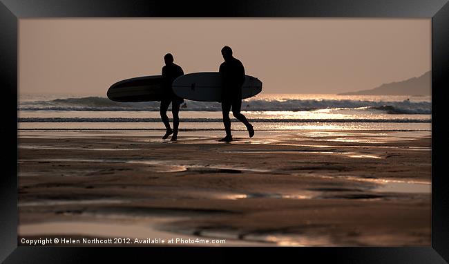 Surfers at Sunset Framed Print by Helen Northcott