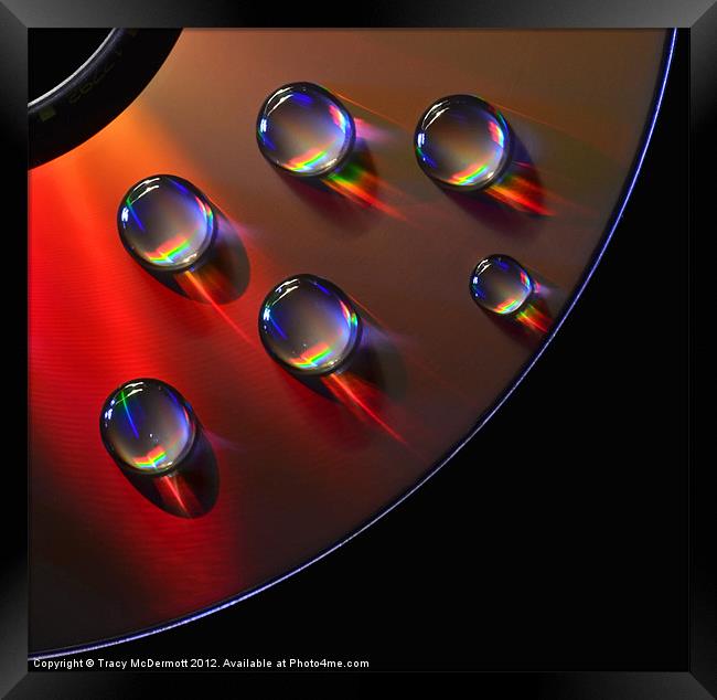 Water drops on CD Framed Print by Tracy McDermott