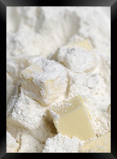 Butter cubes in plain flour Framed Print by J Lloyd