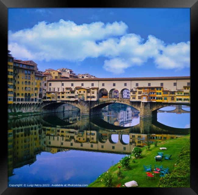 Ponte Vecchio over river Arno in Florence, Italy. Framed Print by Luigi Petro