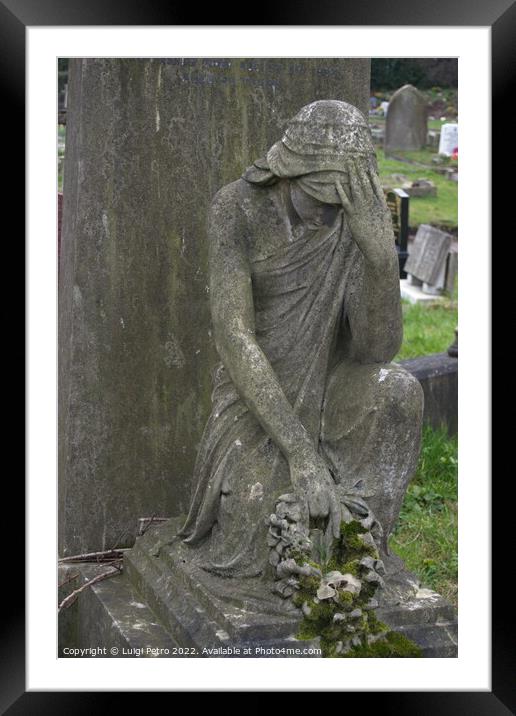 Statue of grieving  woman on a grave. Framed Mounted Print by Luigi Petro
